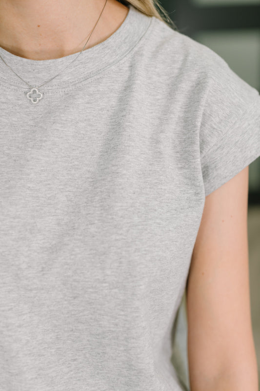 Up close photo of grey dress
